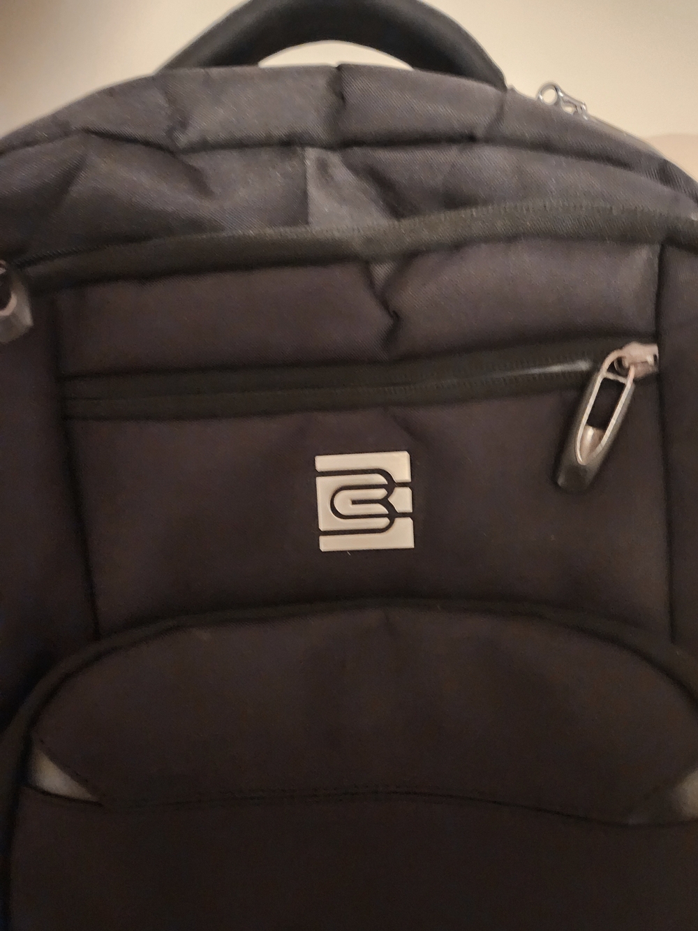 Sleek Black Men's Backpack with Front Logo